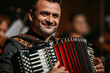 the charismatic presence of a male accordionist during his performance on stage, his eyes conveying passion and artistry, highlighting the artist's talent,