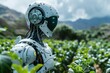 A robot in a field of green plants with mountains in the background.