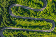 Aerial summer view of a winding mountain road forming an S-shape
