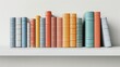 Arrange the pile of Assorted colors books on the shelf. Position the books in a natural, slightly uncluttered way. Place the shelf against a clean, white background to make the colors and details 