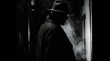 Unknown Person Silhouette. A Mystery Man At Night City In A Raincoat With A Hat On The Street In A Crime Noir Style
