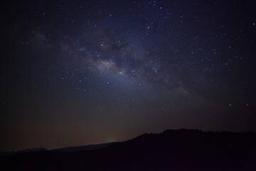 Wall Mural - landscape silhouette tree on high moutain before sunrise with milky way galaxy