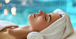 Young woman lying in spa salon and relaxing. Spa treatment concept.