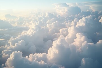 Wall Mural - Fluffy Cumulus Tranquility: High View of Ethereal White Clouds in Nature's Soft Morning Beauty
