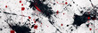 Black and red paint splatters across a white canvas, creating a chaotic yet artistic effect.