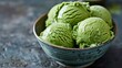 Close-up of a bowl of matcha green tea ice cream, highlighting the unique flavor and vibrant color of the dessert.