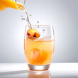 Glass of peach juice on white background
