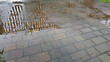 rain and puddles from excessive water on the paving stones