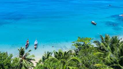 Canvas Print - Tropical beach with palm trees in Phuket Thailand, Banana Beach Phuket on sunny day, Amazing beach Aerial view of Tropical beach sea in the beautiful Phuket island.