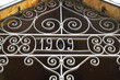 Close-up of an old iron design with inscription 1909 year