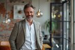 © Photographics - happy smiling mature businessman ceo company manager standing in office at meeting, Generative AI