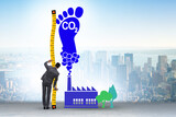 Fototapeta  - Carbon footprint concept with pollution