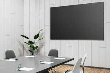 Poster - Modern meeting room interior with furniture and empty black mock up billboard on wall. 3D Rendering.
