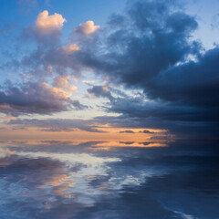stunning dramatic colorful stormy landscape sunset sky with lovely moody contrast in the clouds