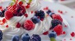 Closeup of Meringue, decorated with cream and berries