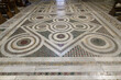 Cosmatesque floor decoration in San Crisogono church in Rome, Italy