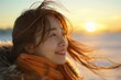 © AIGen - Women In Sun. Asian Woman Enjoying Winter Wind at Sunset on Beach