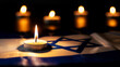 Candle burning on the flag of Israel symbolizing remembrance and solemnity