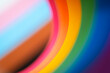 LGBT Pride Month rainbow texture concept. LGBTQIA Pride colorful blurred background. Freedom rainbow flag, selective focus.