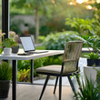 an outdoor living scene, with a focus on a modern workspace comprising a sleek desk, chair, and laptop placed amidst a tranquil garden setting. The artwork should convey a sense of serenity and produc
