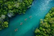 Captivating aerial view of kayakers gliding through tranquil, pristine waters amidst lush, vibrant foliage