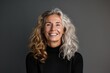 © Leo Rohmann - Woman undergoes face lift with technology in portrait to highlight skincare, addressing aging realities anti-aging care and age adaptation treatment.