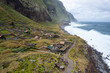 Achadas da Cruz, Madeira, Portugal. The coastal small village with the steepest cable car in Europe. Aerial drone view