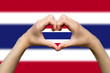 Thailand flag with two hands heart shape, vector design, express love or affection concept, support 