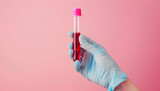 Fototapeta Desenie - Laboratory worker's hand in rubber glove holding test tube with blood sample on light background