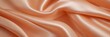 Satin background. Beautiful smooth elegant wavy peach orange satin silk background
