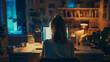 © Лариса Лазебная - A woman working late at night in her home office, fueled by determination to make her business succeed. Diligence and work, team and trust, profit