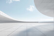 Unmanned concrete floor with huge white curved building with clean bright sky background.