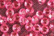 close up of the pink diamond on oink textured backround