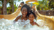 © Muhammad Irfan - mother and daughter enjoying in water park