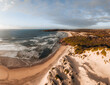 Aerial Drone view One Mile Beach during sunrise sunset with sand dunes. Forster, Great Lakes, Australia