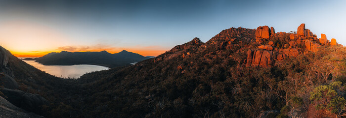 Wall Mural - sunrise sunset aerial view of wineglass bay beach and mount amos. freycinet park, tasmania, australi