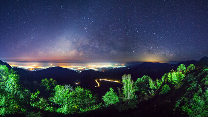 Wall Mural - panorama landscape silhouette tree on high moutain before sunrise with milky way galaxy