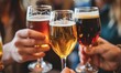 © Vesovic  - The photo shows a close-up of hands clinking glasses filled with various sparkling beverages, conveying a toast