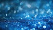 © Ilmi - Blue background with sparkling lights. Modern blue background. Celebration, invitation, card banner. Bokeh background