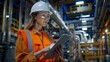 © Studio Nova - A Female Engineer Inspecting Factory