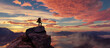 Adventure Woman Hiker Standing on a peak. Mountain Landscape in Background. Dramatic Sunset.