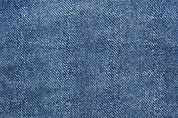 Blue jean texture. Blank denim cloth textile background. Soft fabric. Flat cotton surface. Grunge structure design. Dark navy material. Indigo vintage style. Copyspace