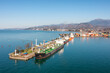 Aerial view industrial cargo and oil port with ship tanker vessel loading in gas and oil terminal station refinery, Batumi, Georgia, Global trading import export logistic transport sea freight