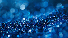 Sapphire-blue Glitter Dances With Elegance Amidst A Blurred Setting, Conjuring Visions Of Deep Ocean Waters And Boundless Serenity.