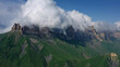 Caucasus mountains under clouds
