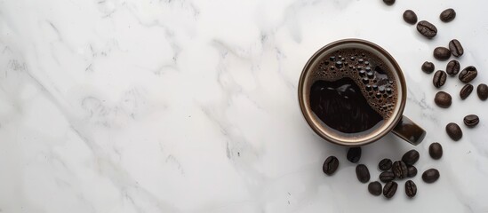 Wall Mural - Hot black coffee is served in cups and placed on a white marble table