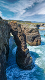 Fototapeta Niebo - Natural rock arches on Cathedrals beach in low tide (Cantabric coast, Lugo (Galicia), Spain).