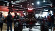 Advanced Red and Black Drone Displayed at a Technology Expo