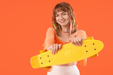 Sticker - Young woman with skateboard on orange background