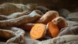 sweet potato on burlap background. selective focus